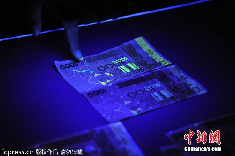 澳门发现假千元港币 超级伪钞逼真难辨_海南楼